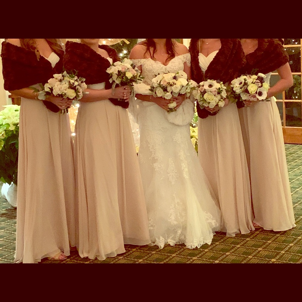 Six faux Fur shawls for wedding party.